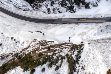 Aerial view of the Richardson Highway, Keystone Canyon, and Lowe River near Valdez, Alaska during the winter.