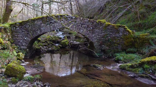Stone bridge in Rucabao in Vega de Pas. Valles Pasiegos, Cantabria, Spain, Europe