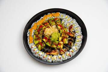 sushi in a plate on a white background rise fish