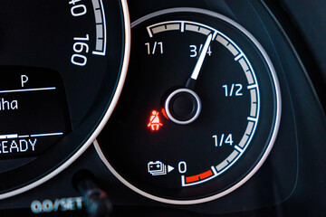 Battery level on the dashboard of electric car. 