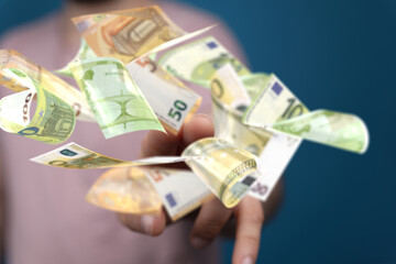 bill euro banknote in hand rain