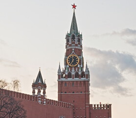 Fototapeta na wymiar Moscow,Russia. HDR view ot the Moscow Kremlin wall and Spasskaya tower. Sunset with clouds