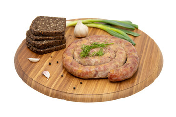 Coiled cumberland sausage with garlic rustic board