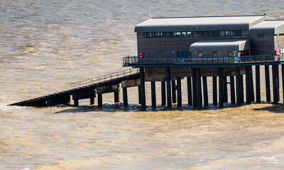 The RNLI lifeboat station located on the end of the pier in the seaside town of Cromer on the North...