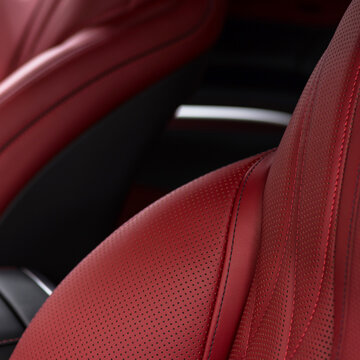 Leather seat material in modern car. Macro photo.