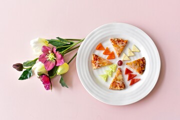 Fun kids food creatively arranged to entice healthy eating for children's meals. Photo concept, creative food, background, copy space
