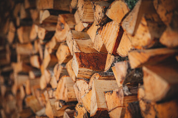 firewood in the village chopped, stacked together, birch