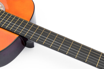 Classical guitar close up isolated on white background with space