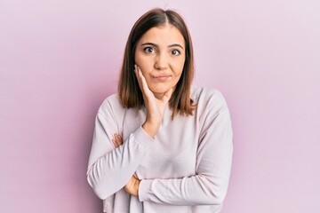Obraz premium Young beautiful woman wearing casual clothes thinking looking tired and bored with depression problems with crossed arms.