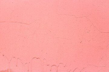 Old wall painted with pink rose paint background image 