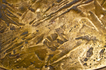 Naturally polished bronze texture close up background image 