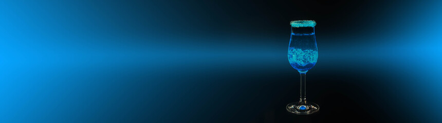 Blue drink in a cocktail glass with ice cubes decorated crystal sugar on the fantastic blue background