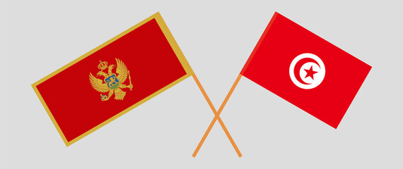 Crossed flags of Montenegro and Tunisia. Official colors. Correct proportion