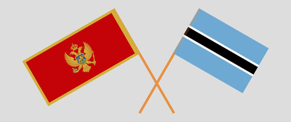 Crossed flags of Montenegro and Botswana. Official colors. Correct proportion