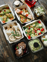 different food from delivery. catering food, takeaway. food for the company in disposable dishes