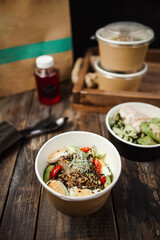 different food from delivery. catering food, takeaway. food for the company in disposable dishes. food delivery with place for brand or text
