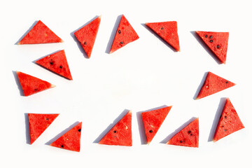 Red ripe watermelon sliced  on a white