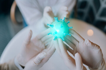 Scientist virologist holding model of new Coronavirus or COVID-19