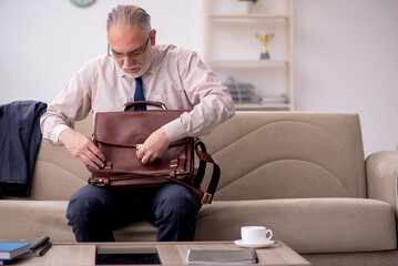 Old businessman employee waiting for business meeting