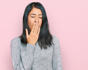 Beautiful asian young woman wearing casual clothes bored yawning tired covering mouth with hand. restless and sleepiness.
