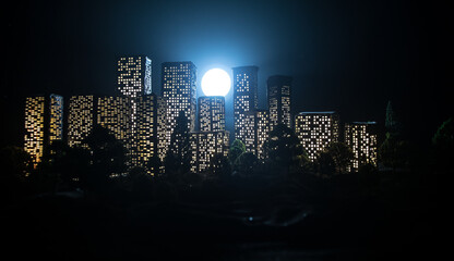 Cartoon style city buildings. Realistic city building miniatures with lights. background.