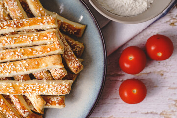 salty sesame bread sticks traditional homemade baked snacks on the table - top view close up healthy vegan or vegetarian food concept with copy space