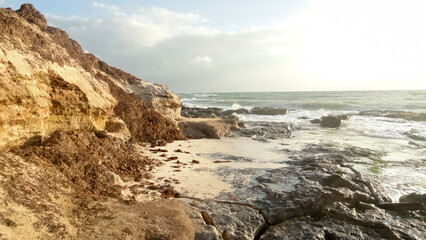Fototapeta premium Rocky Beach Coastline with Wild Ocean Waves