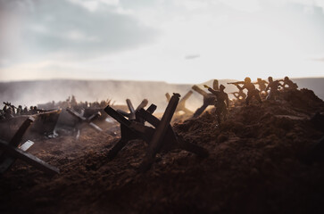 World War 2 reenactment (D-day). Creative decoration with toy soldiers, landing crafts and...