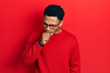 Young african american man wearing casual clothes and glasses feeling unwell and coughing as symptom for cold or bronchitis. health care concept.