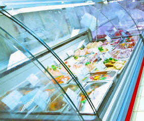 refrigerated display case in supermarket
