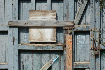 old wooden door ruined by time