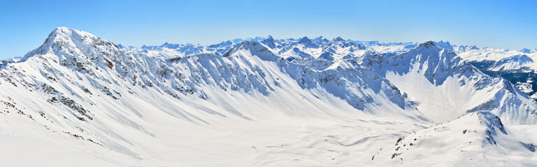 Swiss Alps panorama in Arosa Lenzerheide ski resort, on a sunny Winter day. View from Parpaner...