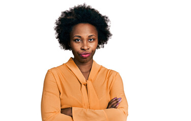 African american woman with afro hair wearing elegant shirt skeptic and nervous, disapproving...