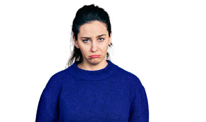 Young hispanic woman wearing casual clothes depressed and worry for distress, crying angry and afraid. sad expression.