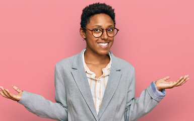 Young african american woman wearing business clothes smiling showing both hands open palms, presenting and advertising comparison and balance