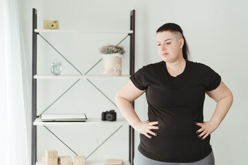 Young woman with obese body, overweight concept