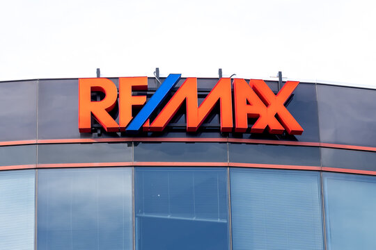 Markham, On, Canada - January 16, 2021: Close up RE/MAX sign on the building. RE/MAX, short for Real Estate Maximums, is an American international real estate company. 