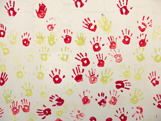 colorful hands painted on school wall, creativity concept