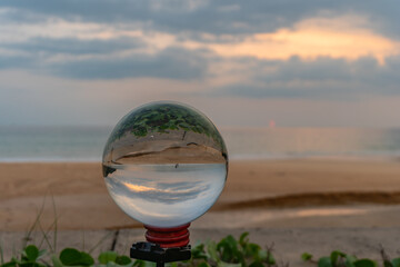 sunset in crystal ball the image that appears in an upside-down looks strange..