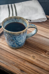 coffee cup on a tray with a napkin