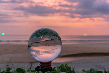 sunset in crystal ball the image that appears in an upside-down looks strange..