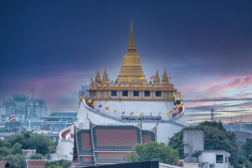 Golden mountain temple in Bangkok during sunset