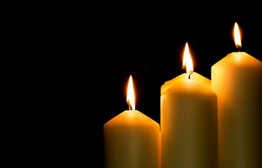 candles that are lit in the dark