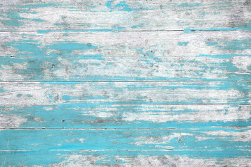 Weathered blue painted wooden wall. Vintage blue wood plank background. Old blue wooden wall coming...