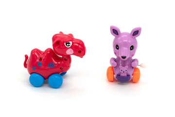Camel and kangaroo plastic toys, isolated on white background.