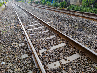 Railroad tracks shoot after rain. Leading line view