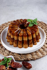 Agar-agar kurma, puding kurma or dates pudding, made of coconut milk, palm sugar and dates.