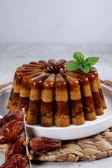 Agar-agar kurma, puding kurma or dates pudding, made of coconut milk, palm sugar and dates.
