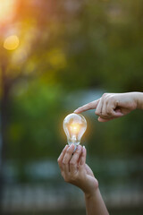 light bulb against nature, icons