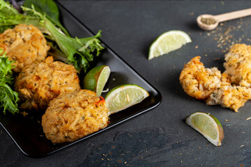 made with blue crab caught in Chesapeake bay, Crab cake is a favorite dish in the state of Maryland. Meat is mixed with sauces, crumbles, seasoning and vegetables and shaped in to patties to grill